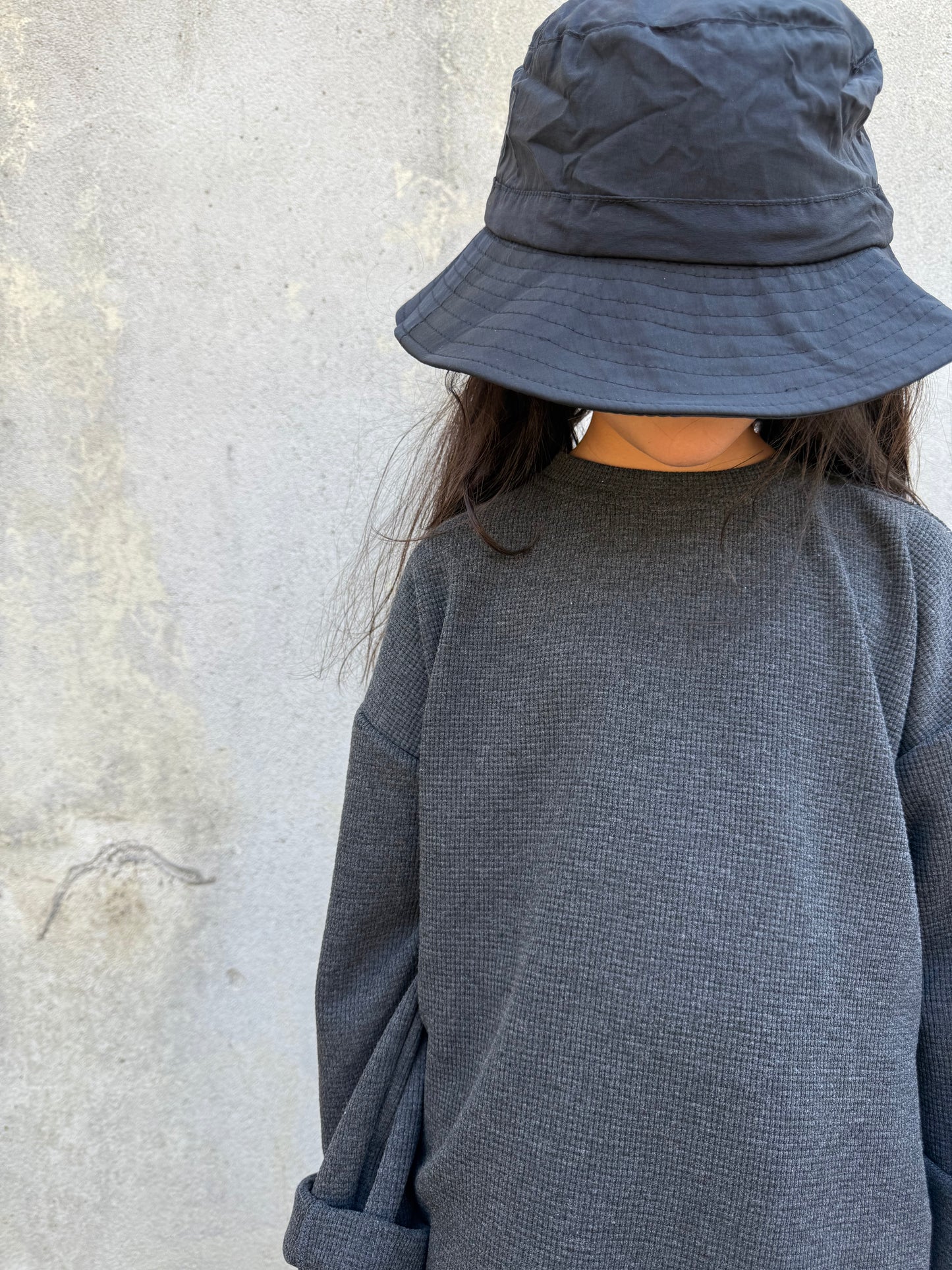 Le haut maille - gris